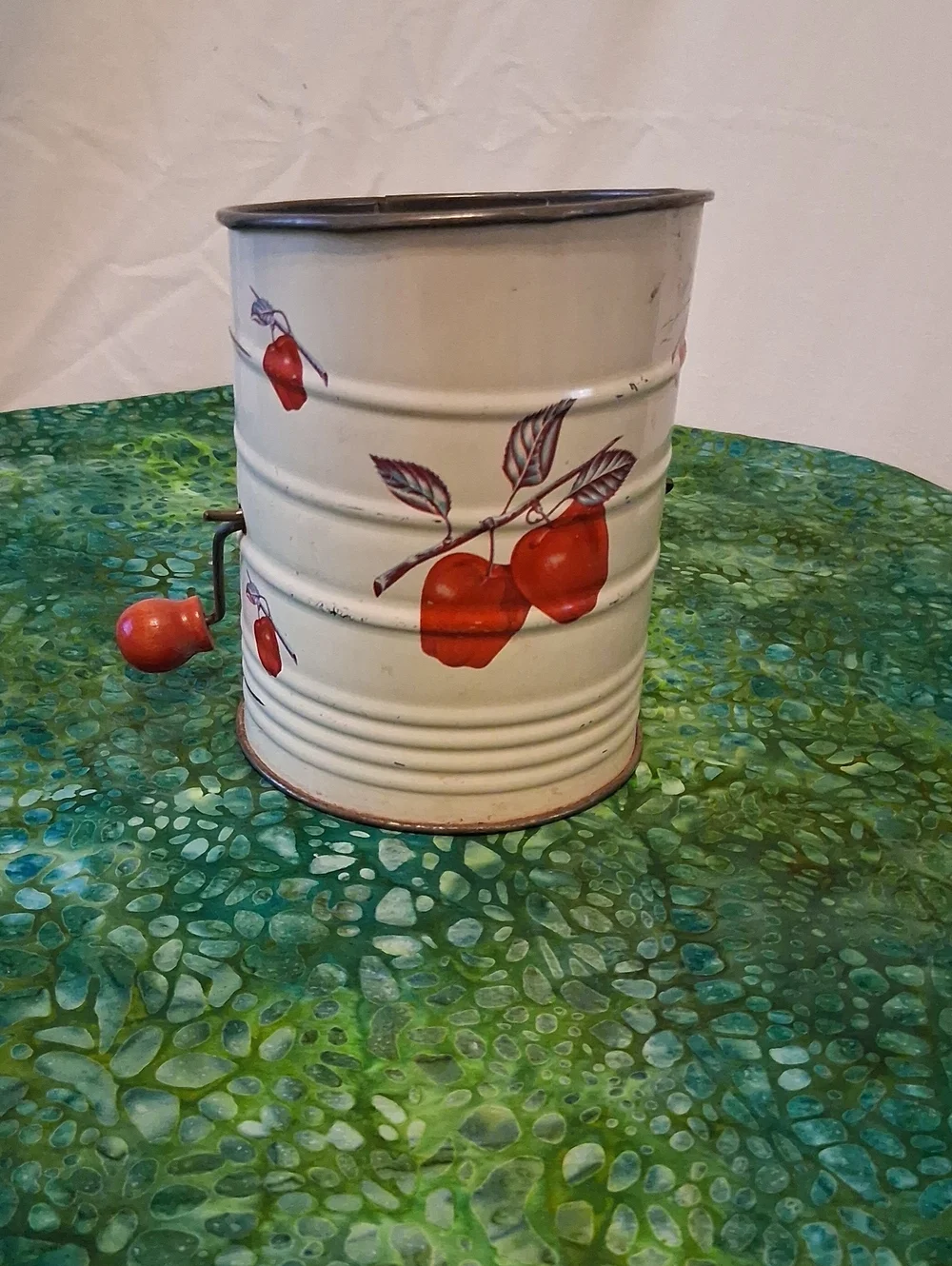 Vintage Cream Metal Flour Sifter with Red Apple Motif